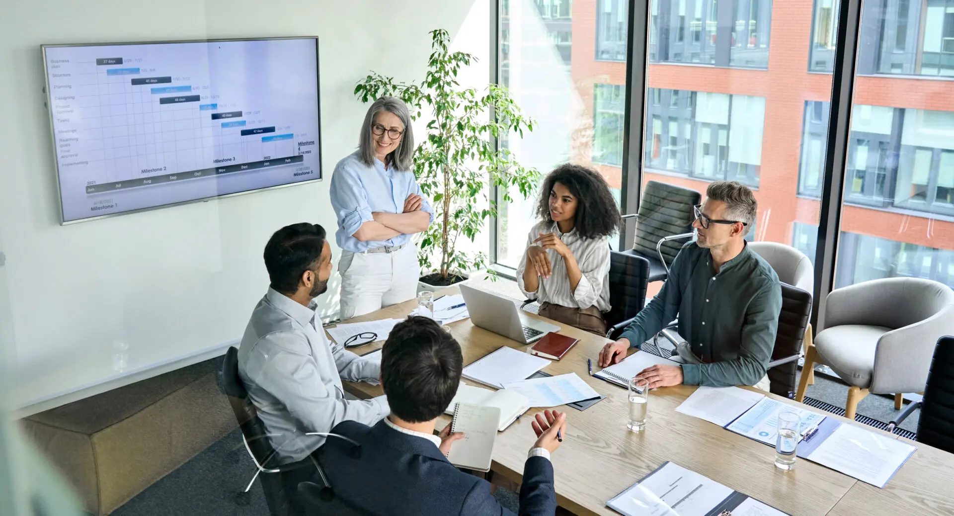 Business meeting with presentation and discussion.