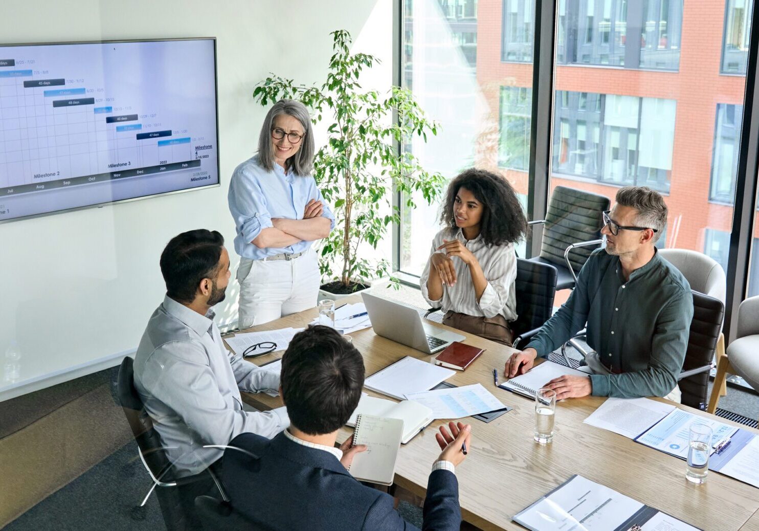 Business meeting with presentation and discussion.